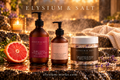 Ruby Vista Hand & Body Wash, Chenille Cloud Body Cream and The Languid Soak Mineral Bath Salt beside a cut pink grapefruit in a warm candlelit setting.