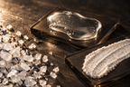 Salt crystals, clear gel and grain-bearing scrub on separate surfaces.